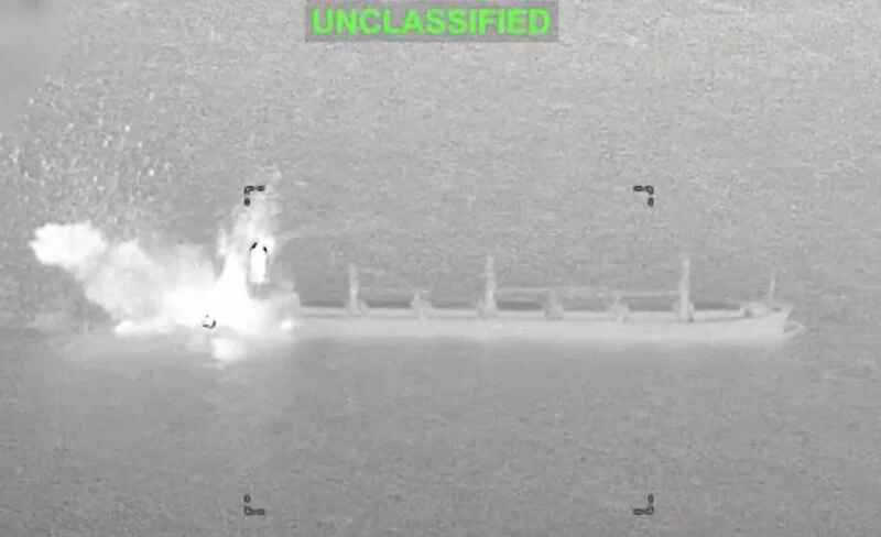 Thermal imagery showing an explosion near the stern of a cargo vessel in the Gulf of Oman during a U.S. military strike on October 10, 2026.